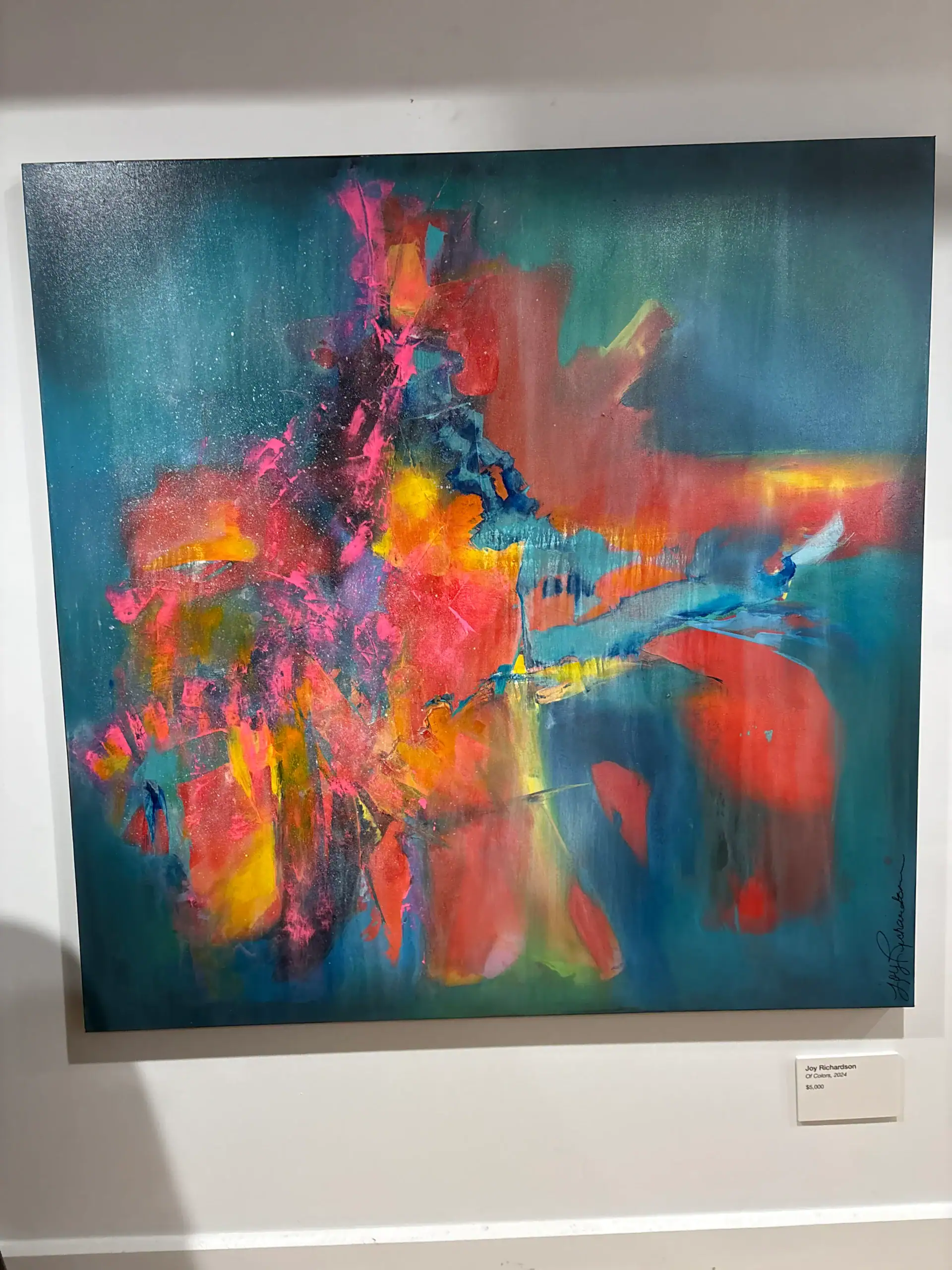 Vibrant abstract painting features colorful splashes, ideal for a chic NYC Wine Bar & Art Gallery space.