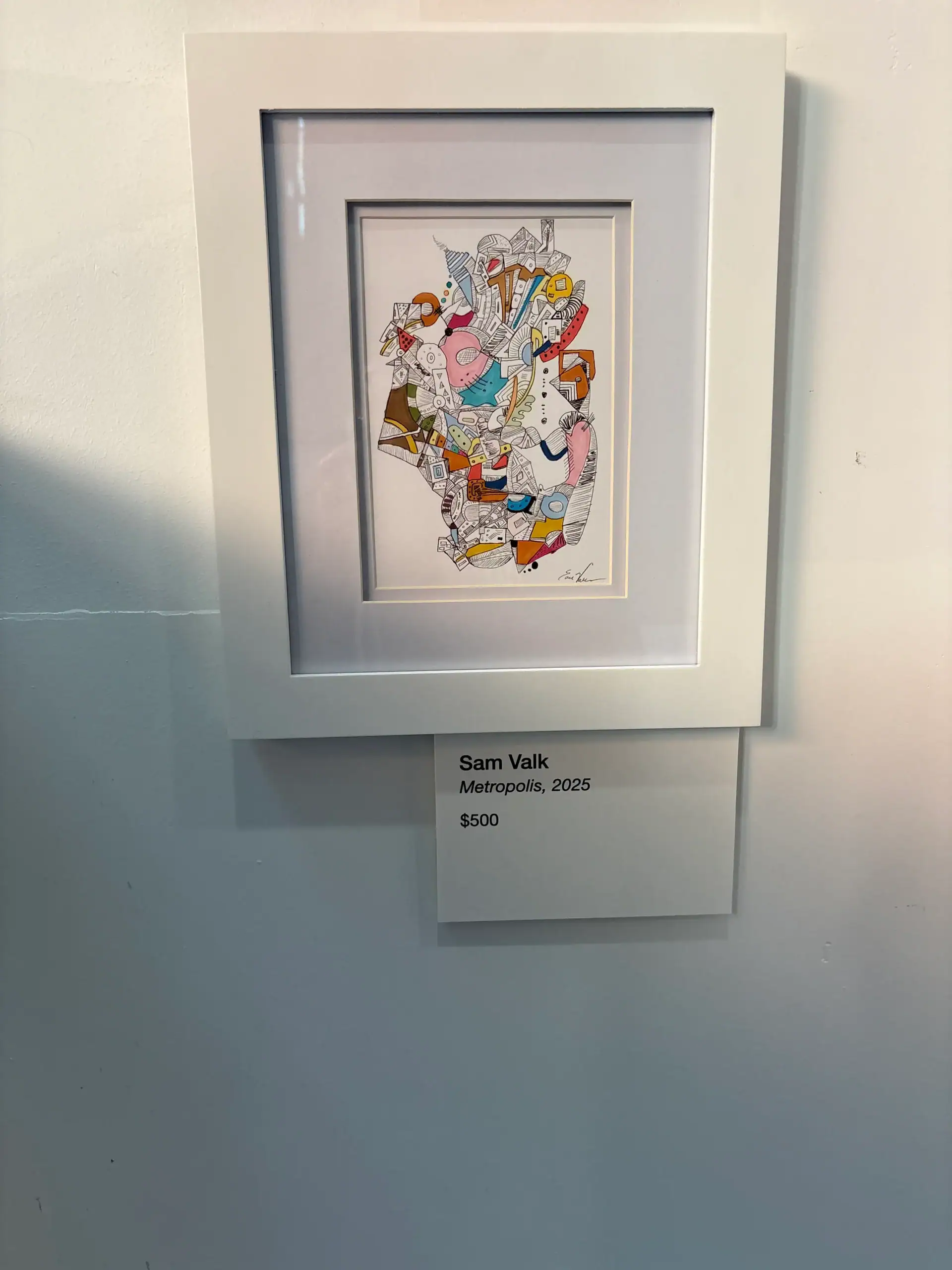 Framed abstract artwork titled “Sam Valk, Metropolis, 2025” on display at a NYC Wine Bar & Art Gallery.