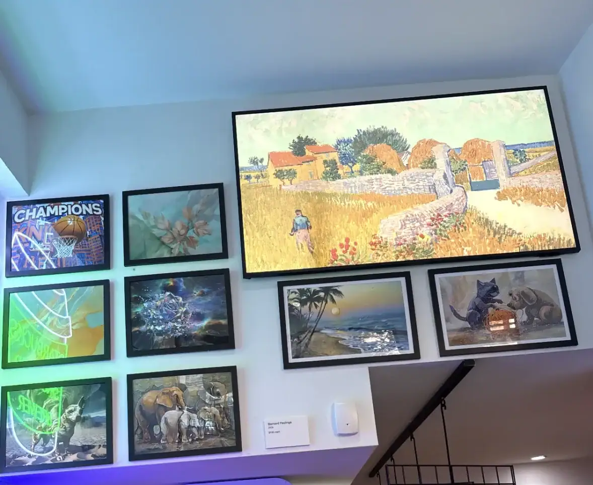 A wall at this NYC Wine Bar & Art Gallery features vibrant art of animals, beaches, flowers, and landscapes.